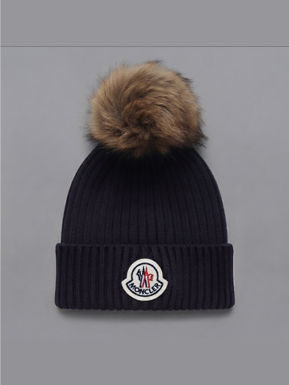 Moncler Men’s Navy Knit Beanie with Fur Pom